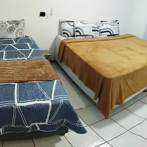 Quarto em Acomodações Particulares Em Casa De Familia, Joinville